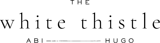 The White Thistle Logo